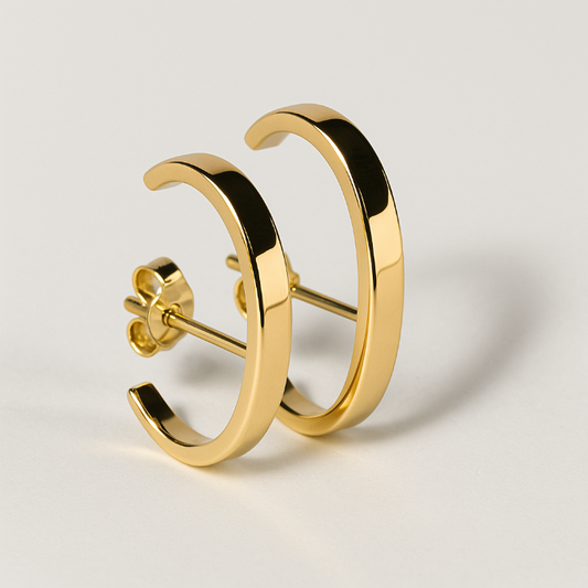 Ohrring Saga doppelt aus 14k Gold in Nahaufnahme glaenzend